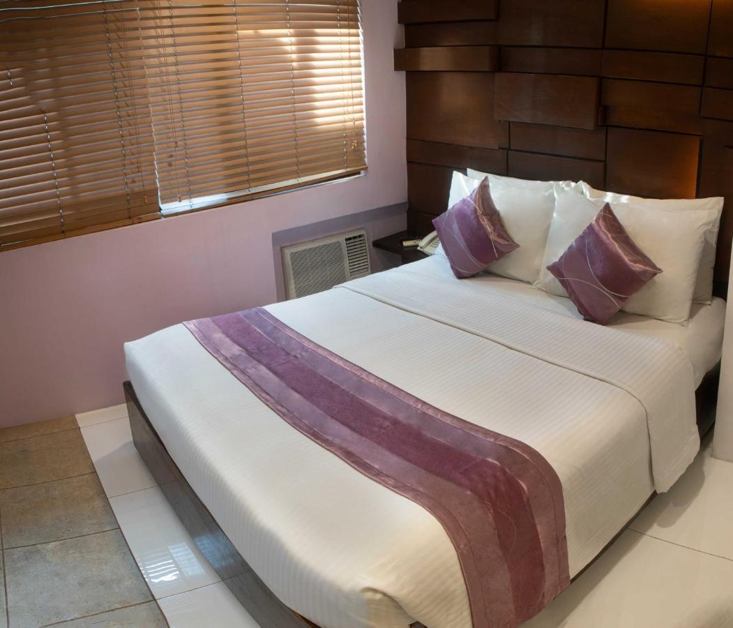 Acl Suites Cidade Quezon Exterior foto