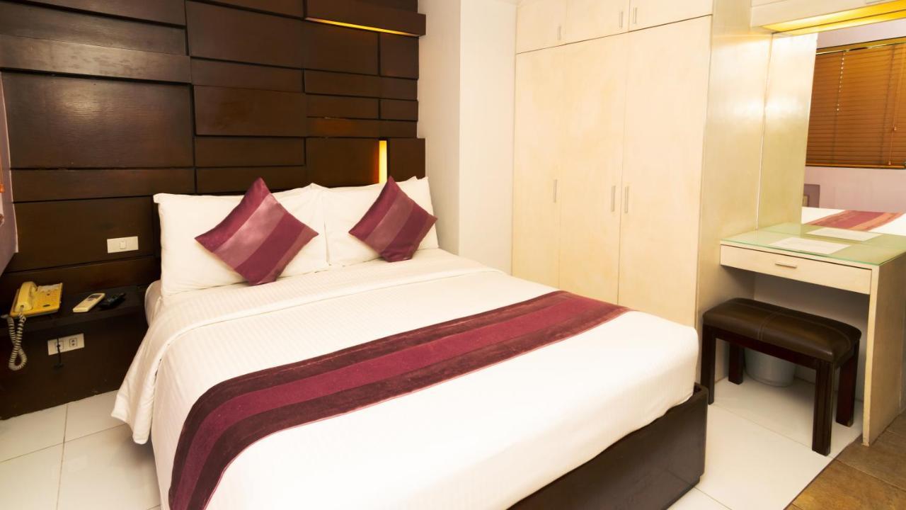 Acl Suites Cidade Quezon Exterior foto